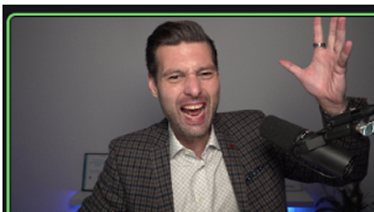 Man enthusiastically speaking with a microphone