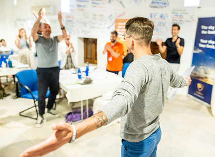 Engaging group workshop with attendees participating enthusiastically