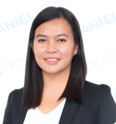 Professional woman with black blazer and smiling