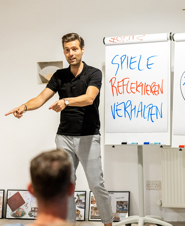 Speaker presenting ideas at a workshop