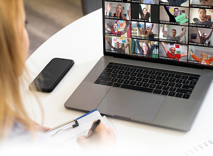 Person participating in a video conference call.
